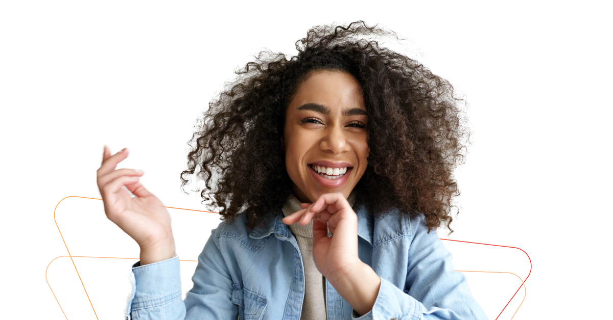 A woman with curly hair is making a gesture with her hands while emphasizing sales priorities.