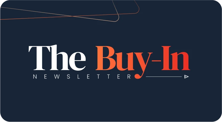 Dark background with the text "The Buy-In Newsletter" in large white and orange letters, featuring a thin arrow under "Newsletter" and abstract lines in the top left—perfect for staying ahead in B2B marketing and engaging B2B buyers. Consensus