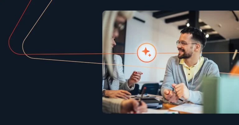 Three colleagues are engaged in a discussion around a table, with papers and pens in front of them. One man is smiling and listening to a woman who is gesturing with her hand, discussing how AI can boost the presales process. A star icon overlays the image.