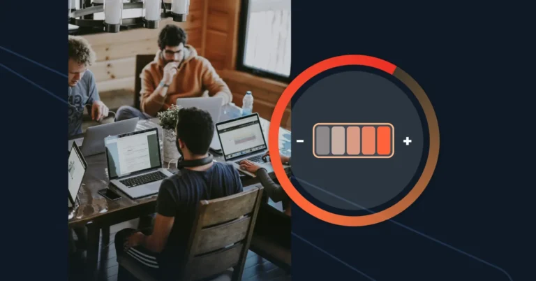 People working at laptops around a table, overlaid with a low battery icon, suggests it's time for renewal, ensuring the energy needed to stay productive.